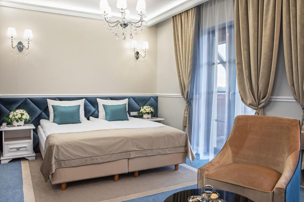 Boutique Odyseja & Spa Ciechocinek Exterior foto A room at the hotel